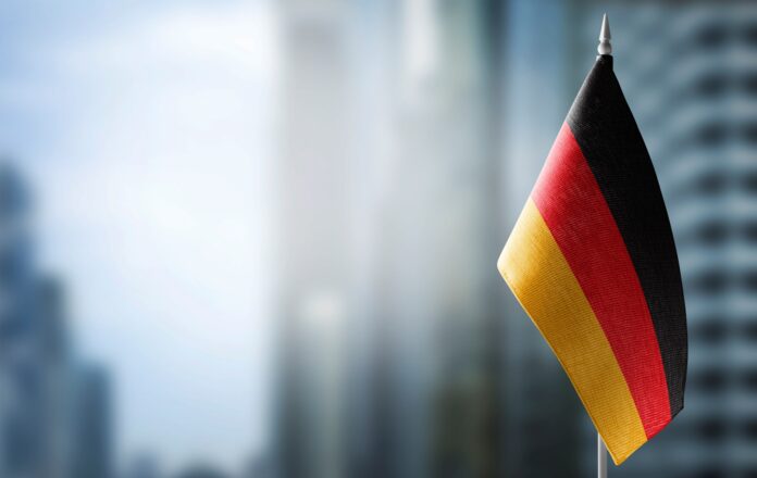 small-flag-germany-blurred-city (2)